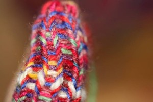 ... and stretched horizontally. Stitches and ladders between stitches both open up.