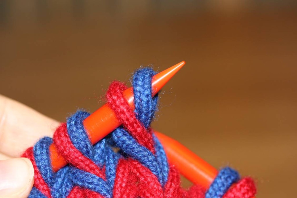 Then transfer both stitches to the left needle.