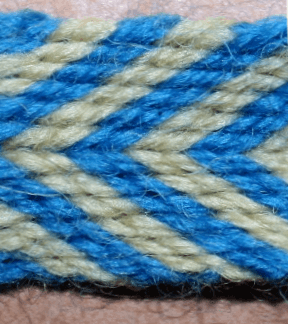 Band with chevron stripes. This will still be done in the workshop - but not as the basic setup for the twill part.